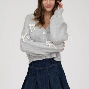 BOW DETAIL BUTTON DOWN CROPPED KNIT CARDIGAN